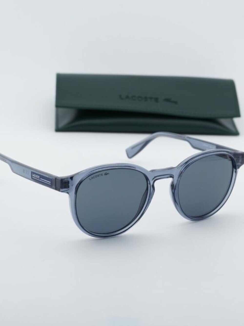 Lacoste L6055S N 038 Round Sunglasses - Transparent Grey / Grey